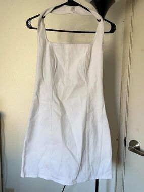 White denim mini halter dress.